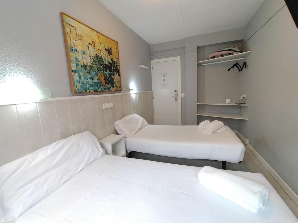 Quarto Twin com Casa de Banho Partilhada